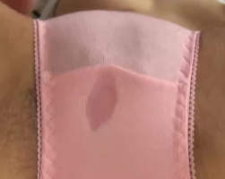 Horny Japanese girl with a wet spot, sensual clit rub through her panty