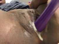 Small purple vibrator makes her ooze creamy goo