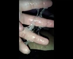 Chubby girl with a fat pussy plays with her stringy sticky vaginal slime
