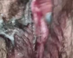 She rubs her wet hairy muff with her vaginal grool