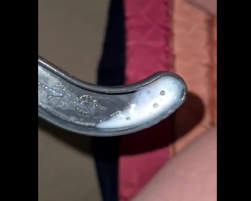 Amateur woman creams as she fucks with a coat hanger